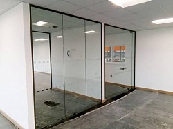 Glass doors and frameless compartment